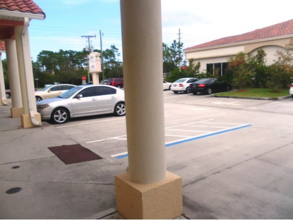 7827 North Wickham Road Melbourne, FL 32940 - Photo 12 of 13 Tons of parking