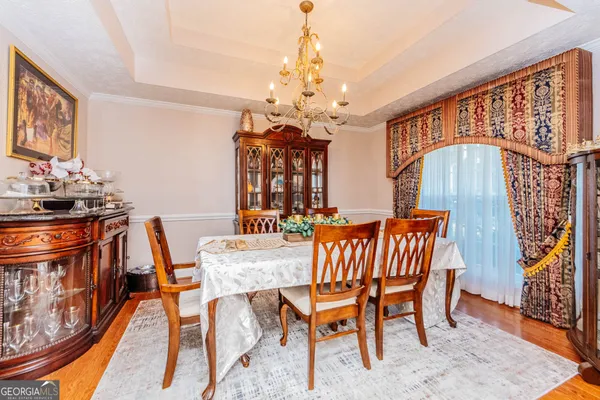 a bathroom with a granite countertop sink and a stove