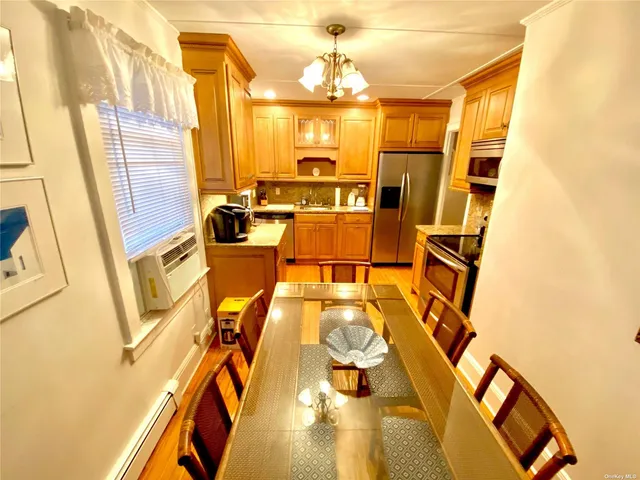 a view of a swimming pool with seating area