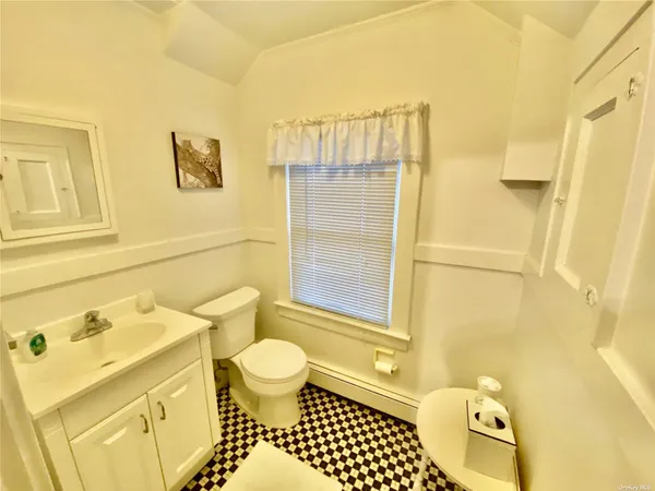 a view of balcony with wooden floor and city view