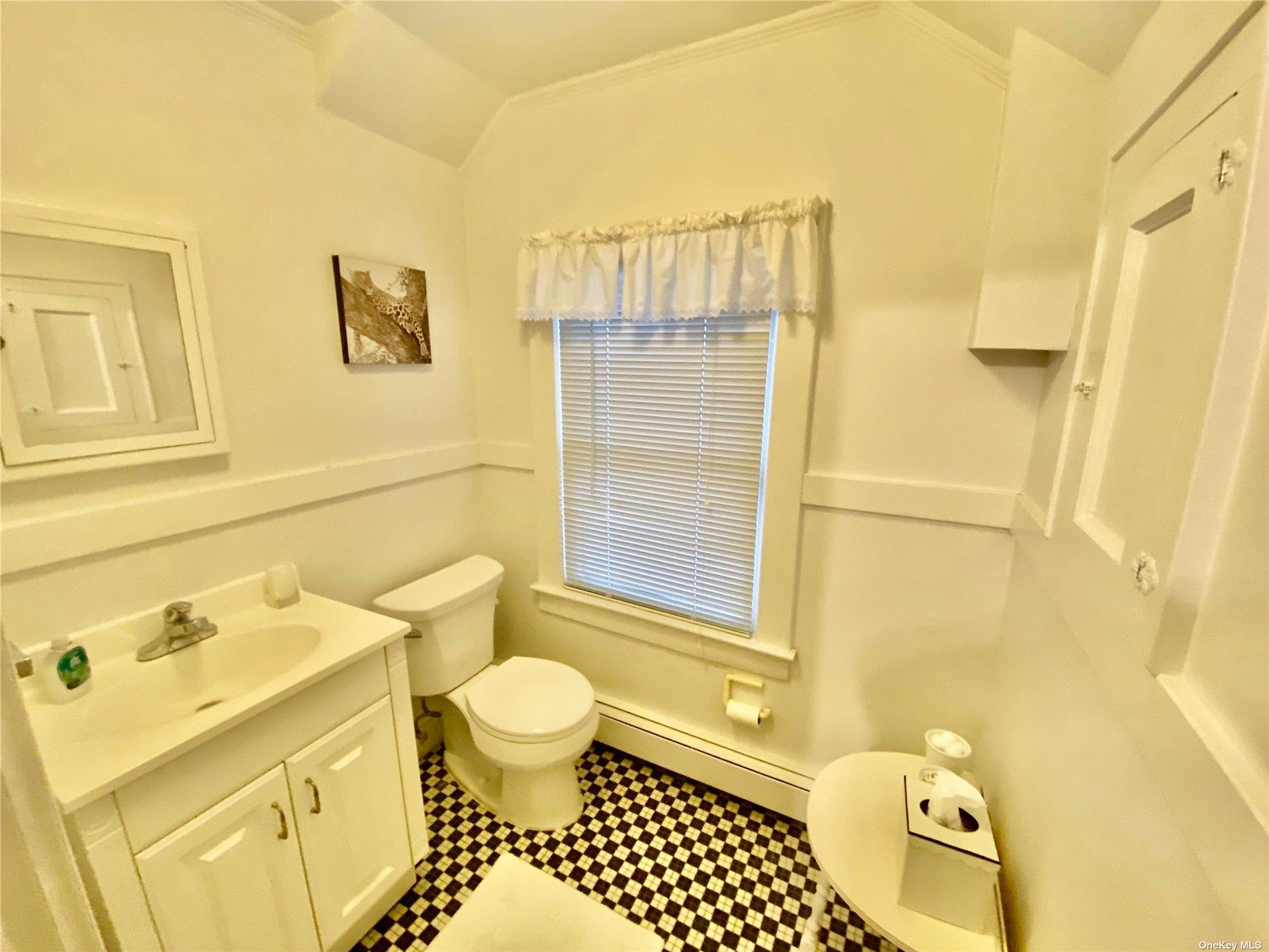 111 Inwood Avenue Point Lookout, NY 11569 - Photo 10 of 11 a bathroom with a sink toilet and shower