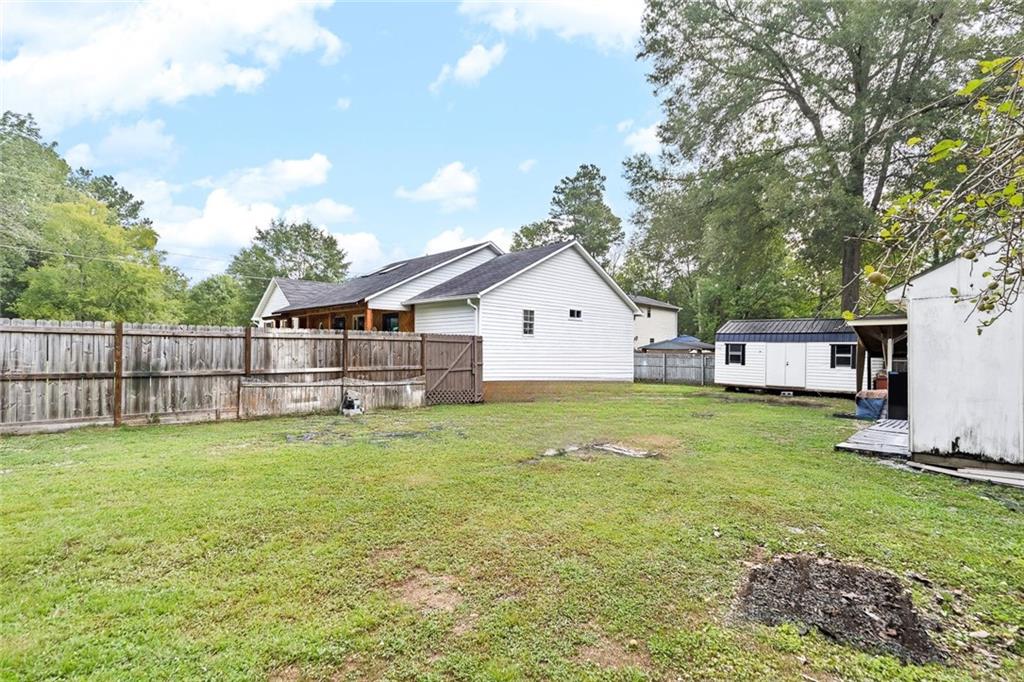 52 Glenda Drive Southwest Rome, GA 30165 - Photo 39 of 50 a view of a house with a yard and sitting area