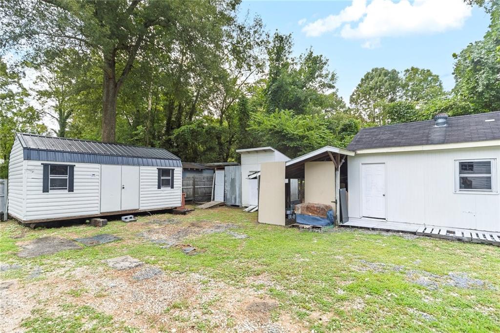 52 Glenda Drive Southwest Rome, GA 30165 - Photo 40 of 50 a view of a backyard with a house