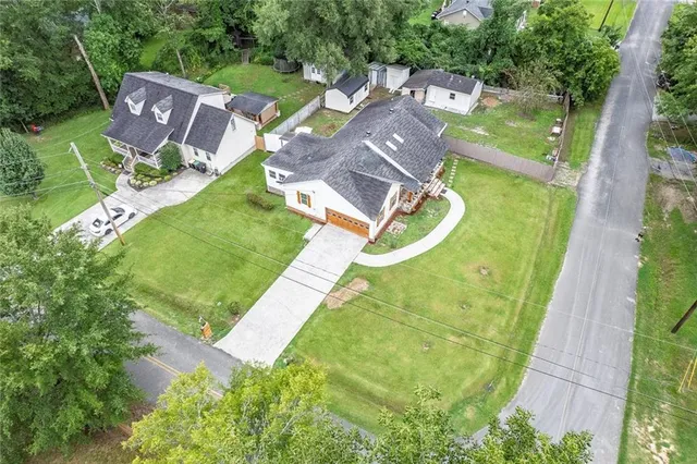 a picture of a bathroom with a sink and mirror
