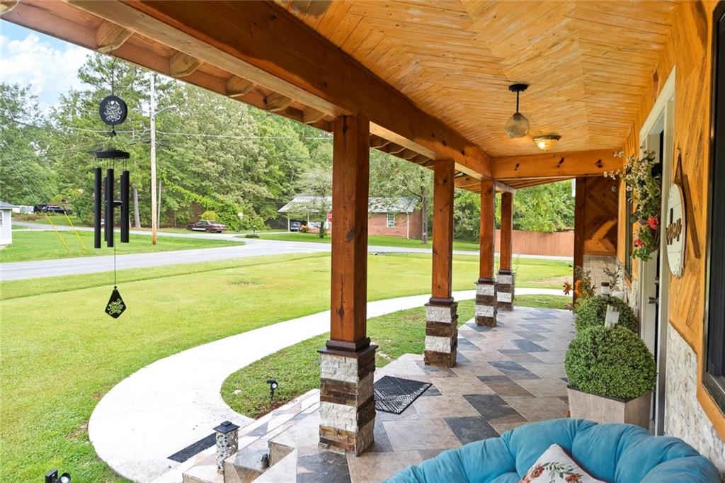 52 Glenda Drive Southwest Rome, GA 30165 - Photo 9 of 50 a view of a swimming pool with chairs in patio
