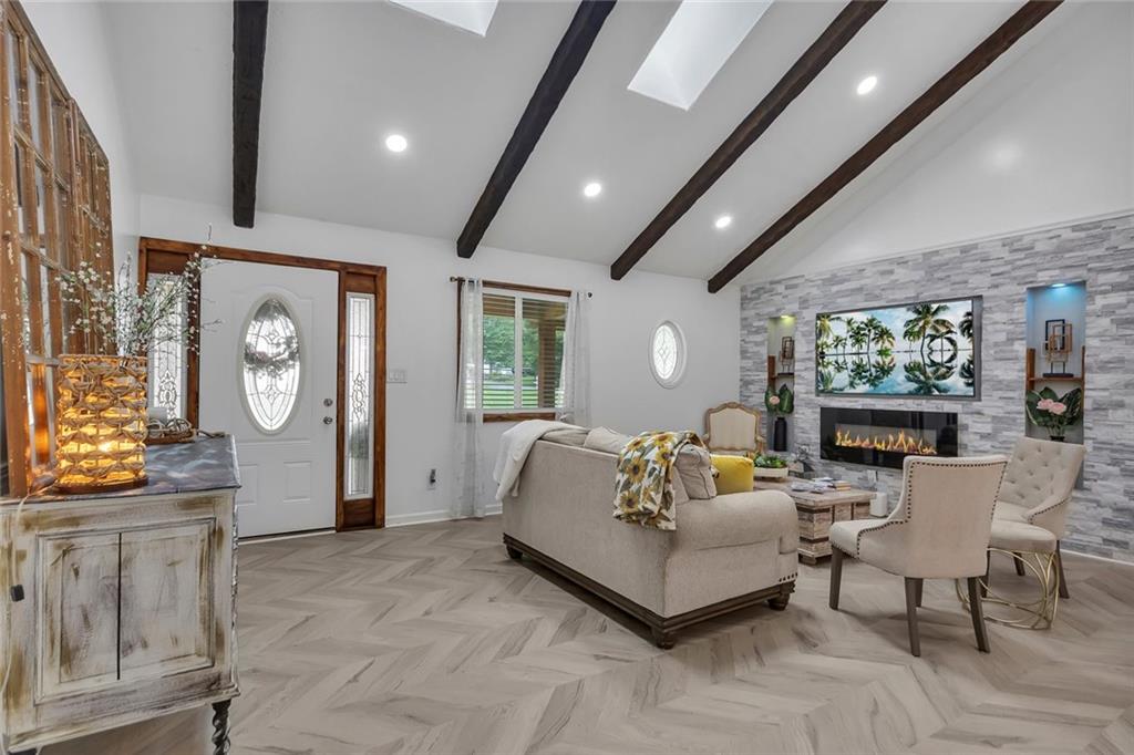 52 Glenda Drive Southwest Rome, GA 30165 - Photo 10 of 50 a bedroom with furniture and a large window