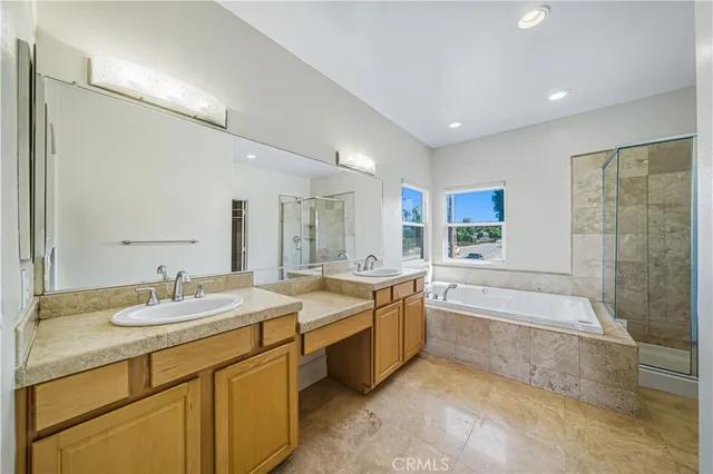 an empty room with a ceiling fan and window