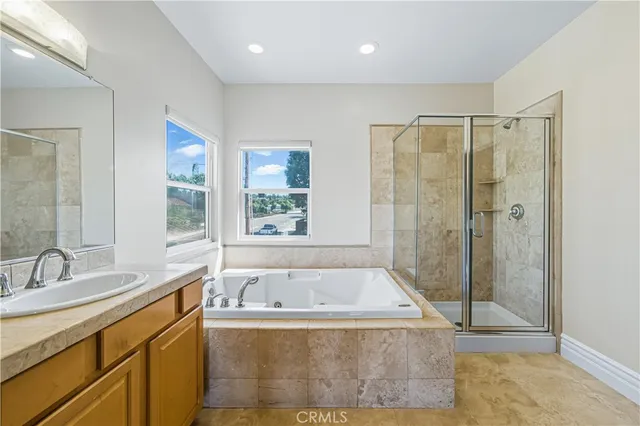 a view of a livingroom and an empty room