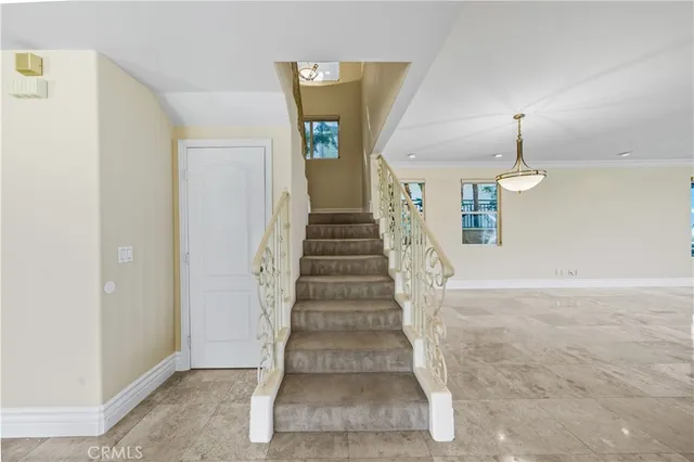 a bathroom with a granite countertop sink toilet a mirror and shower