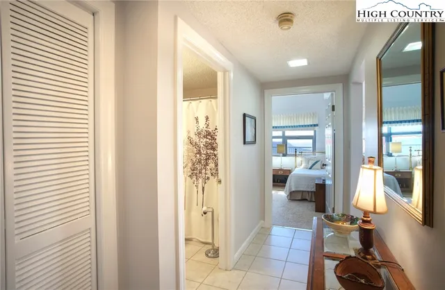 a view of a livingroom with couch and a window