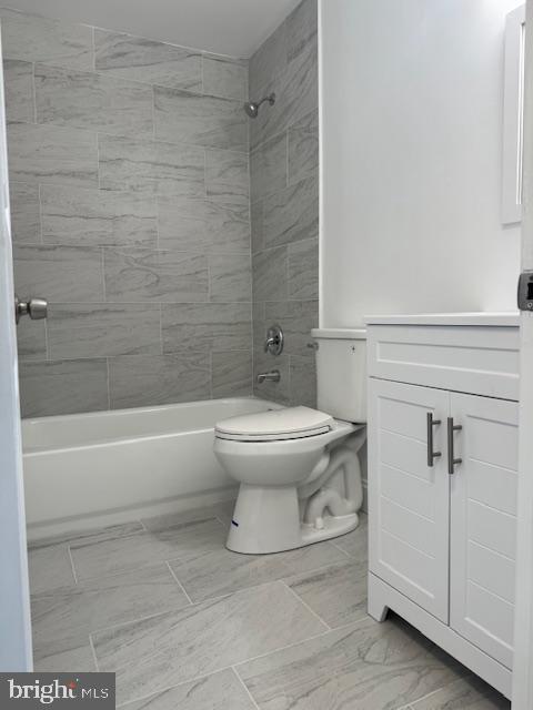 106 Mountain Road, Unit 2C Pasadena, MD 21122 - Photo 13 of 17 a bathroom with a toilet and a shower