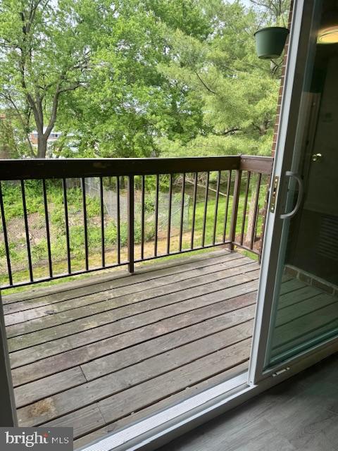 106 Mountain Road, Unit 2C Pasadena, MD 21122 - Photo 16 of 17 a view of a balcony with an outdoor space