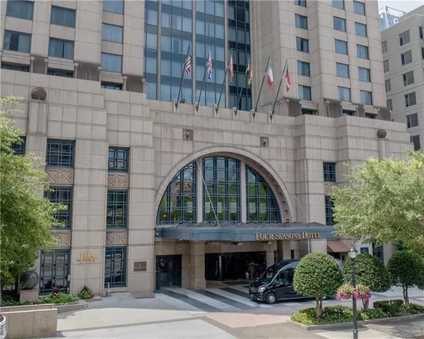 a view of building with a garden