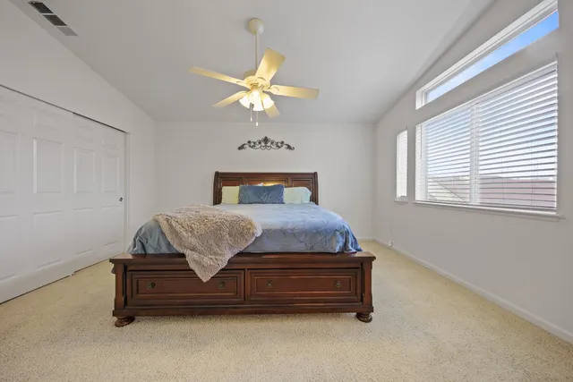 a view of a room that has a window in it