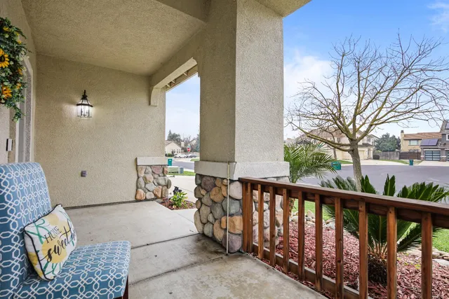 a kitchen with stainless steel appliances granite countertop a refrigerator stove and sink