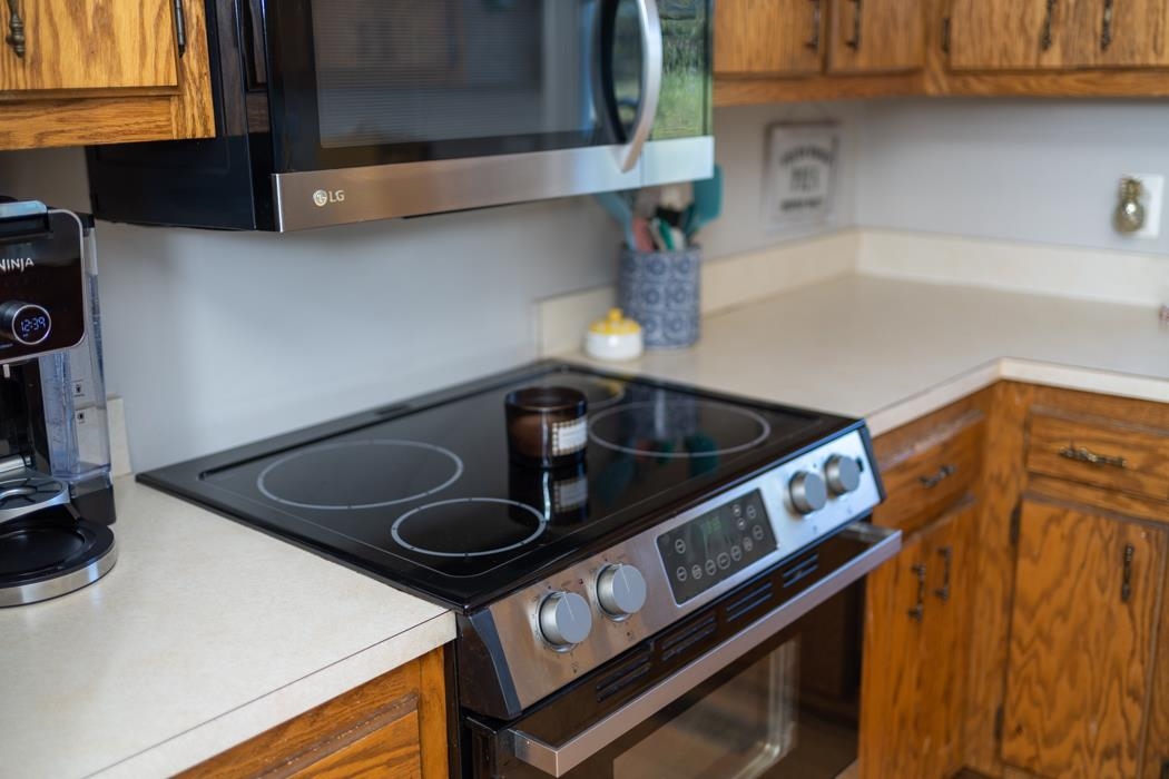 138 Buckboard Road Waynesboro, VA 22980 - Photo 11 of 54 a kitchen with a stove and a sink