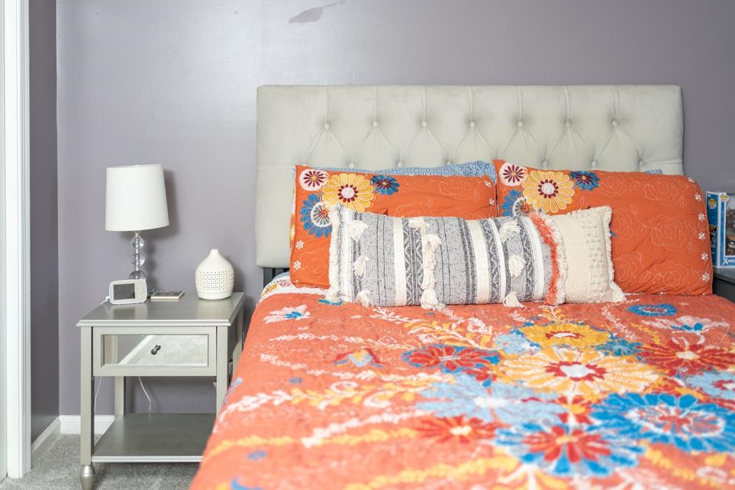 138 Buckboard Road Waynesboro, VA 22980 - Photo 23 of 54 a bedroom with a bed and a lamp