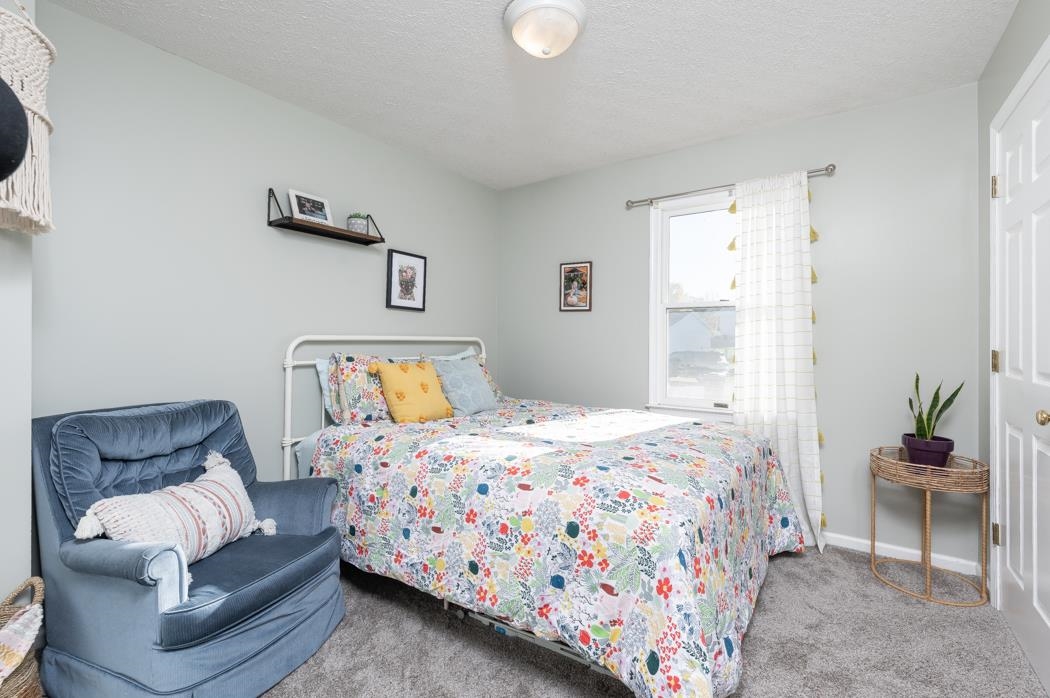 138 Buckboard Road Waynesboro, VA 22980 - Photo 26 of 54 a bedroom with a bed and a couch
