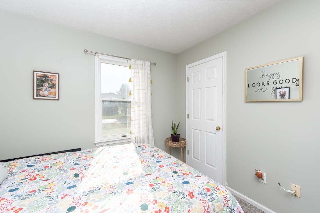 138 Buckboard Road Waynesboro, VA 22980 - Photo 29 of 54 a bedroom with a bed and a window