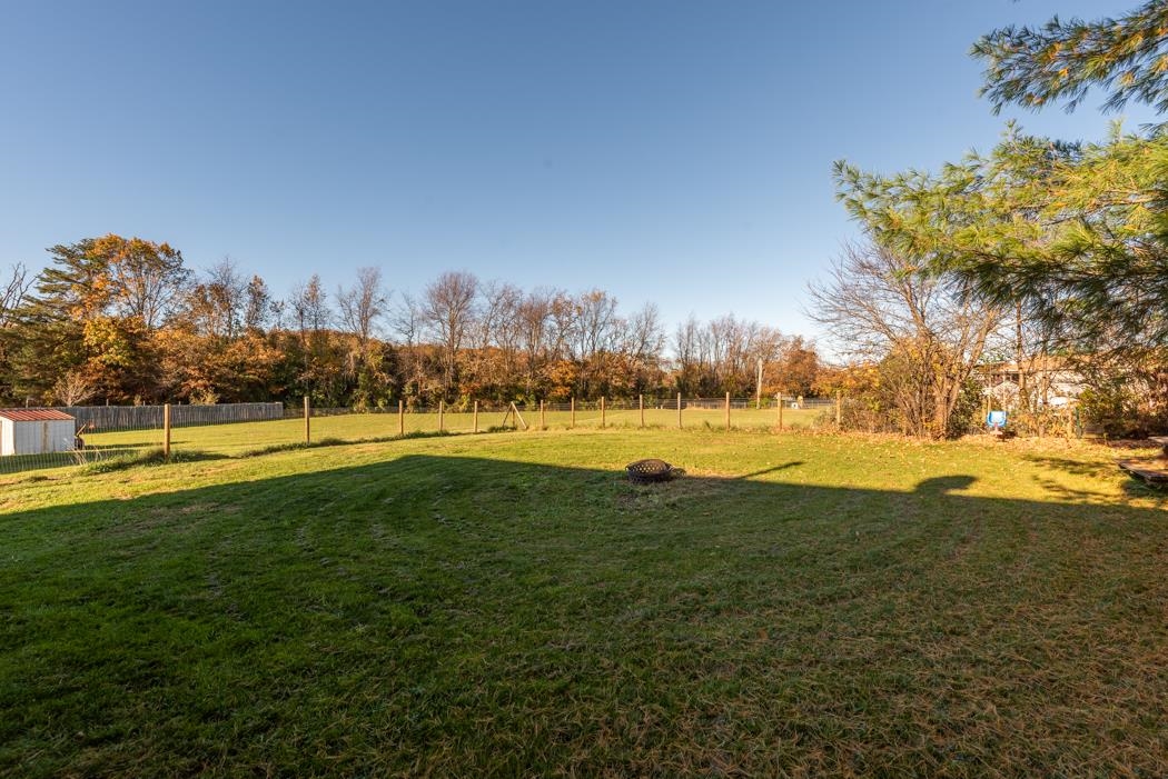 138 Buckboard Road Waynesboro, VA 22980 - Photo 46 of 54 a view of a lake with a big yard