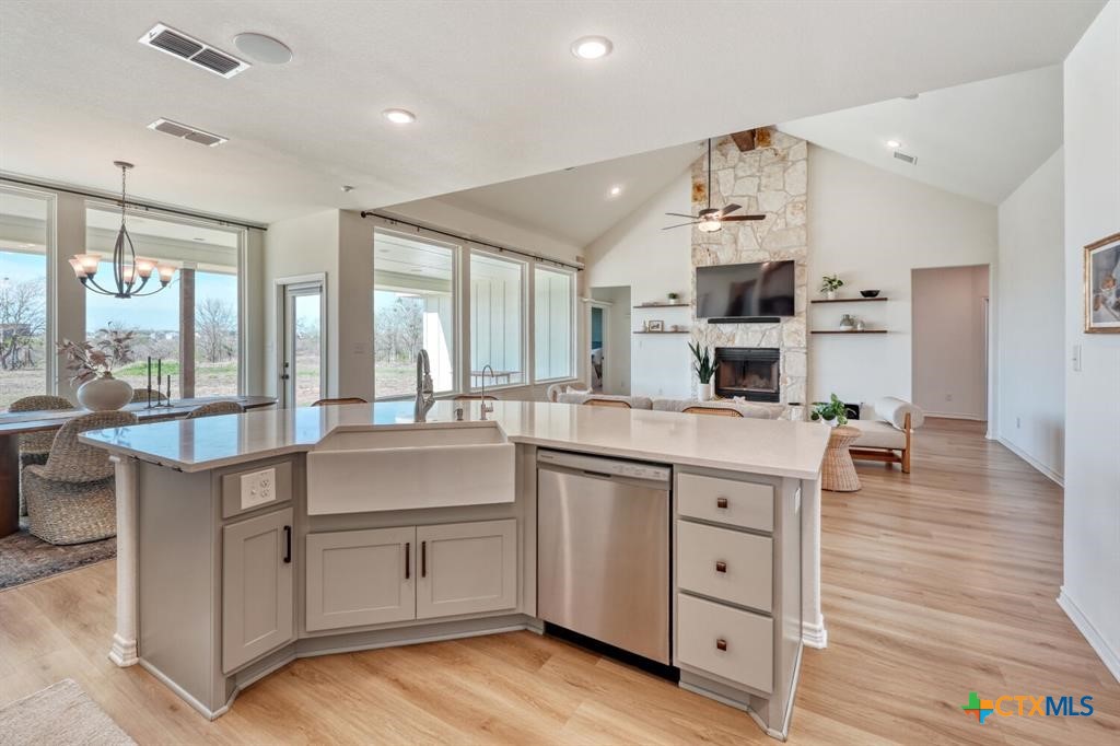 1642 Scull Road San Marcos, TX 78666 - Photo 7 of 31 Open kitchen with expansive island overlooking the living area, designed for everyday living and entertaining.