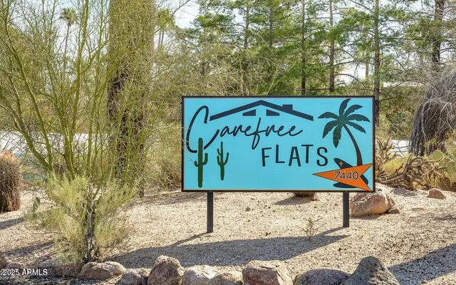 a view of a bedroom with furniture and garden
