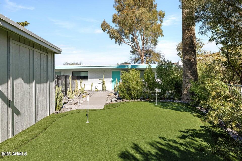 7440 East Cave Creek Road, Unit 6 Carefree, AZ 85377 - Photo 23 of 46 a view of a house with backyard and sitting area