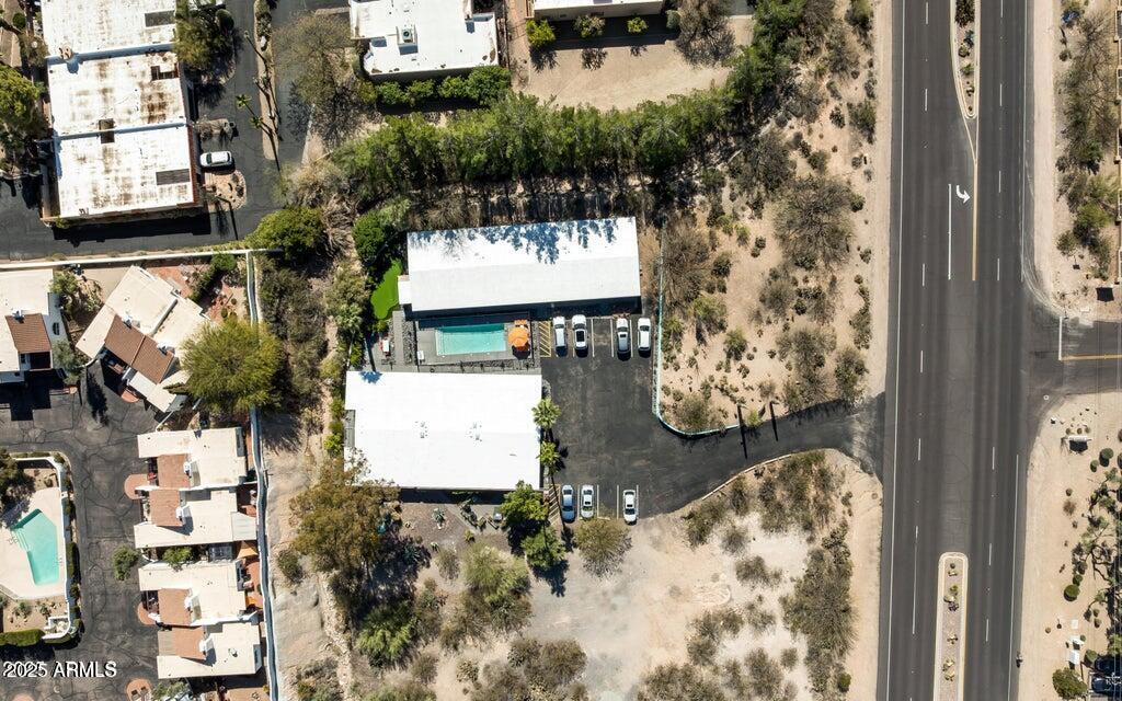 7440 East Cave Creek Road, Unit 6 Carefree, AZ 85377 - Photo 33 of 46 an aerial view of a house with outdoor space and swimming pool
