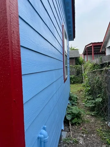 a backyard of a house with lots of green space