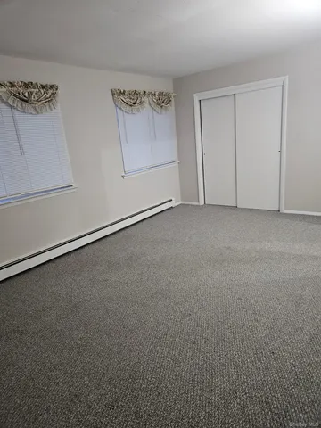 a view of a kitchen with a sink and dishwasher