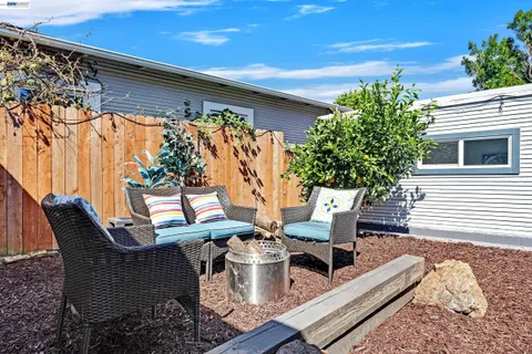 a view of outdoor dining space in the backyard