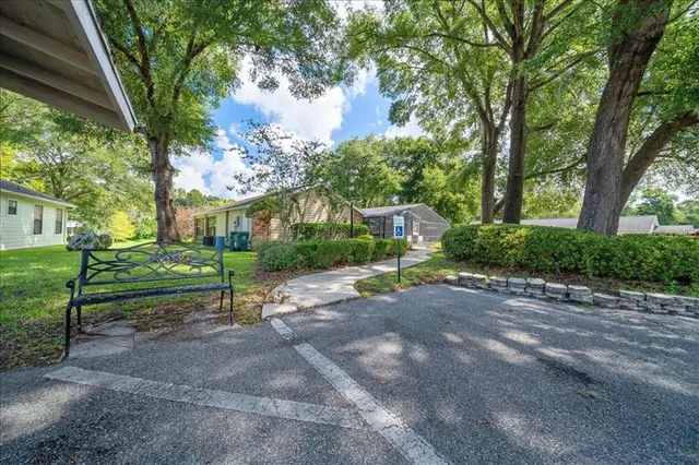 a view of a backyard with green space