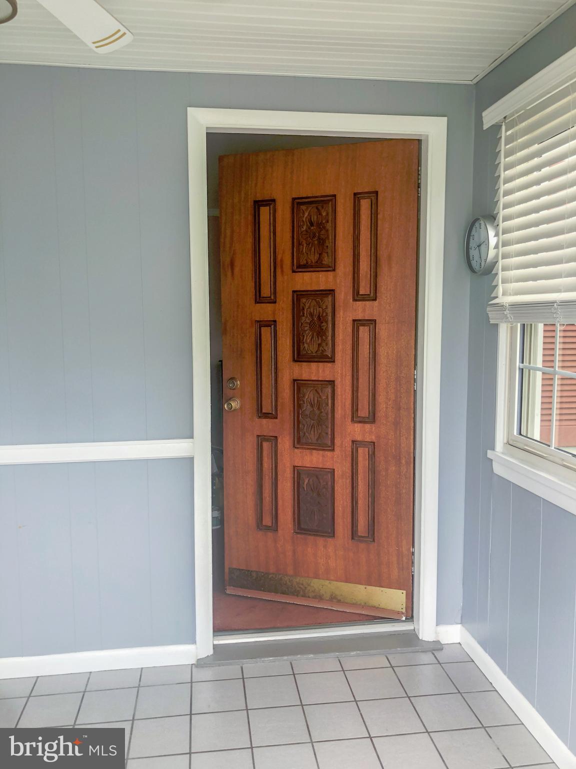 1450 Kent Road Baltimore, MD 21221 - Photo 6 of 55 Sunporch - door to living room