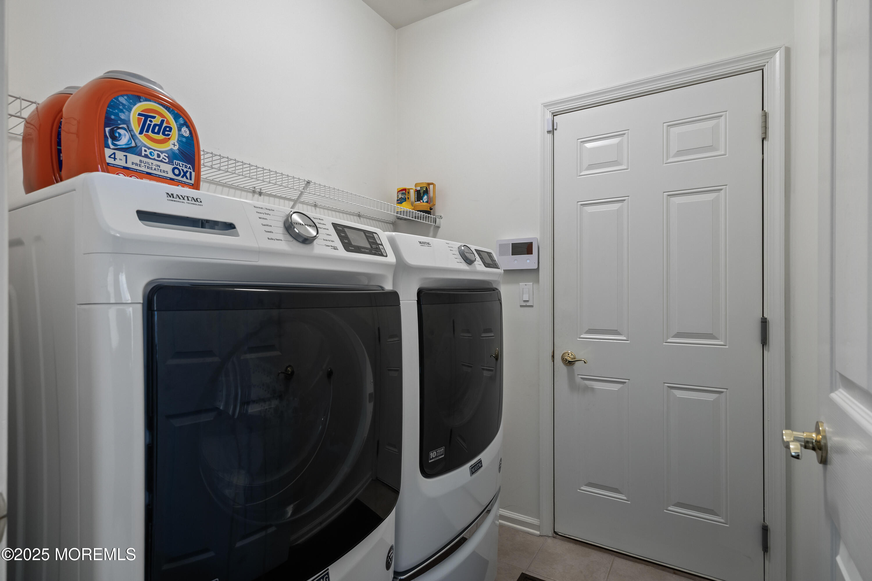 67 Sequoia Parkway Asbury Park, NJ 07712 - Photo 22 of 38 a utility room with dryer and washer