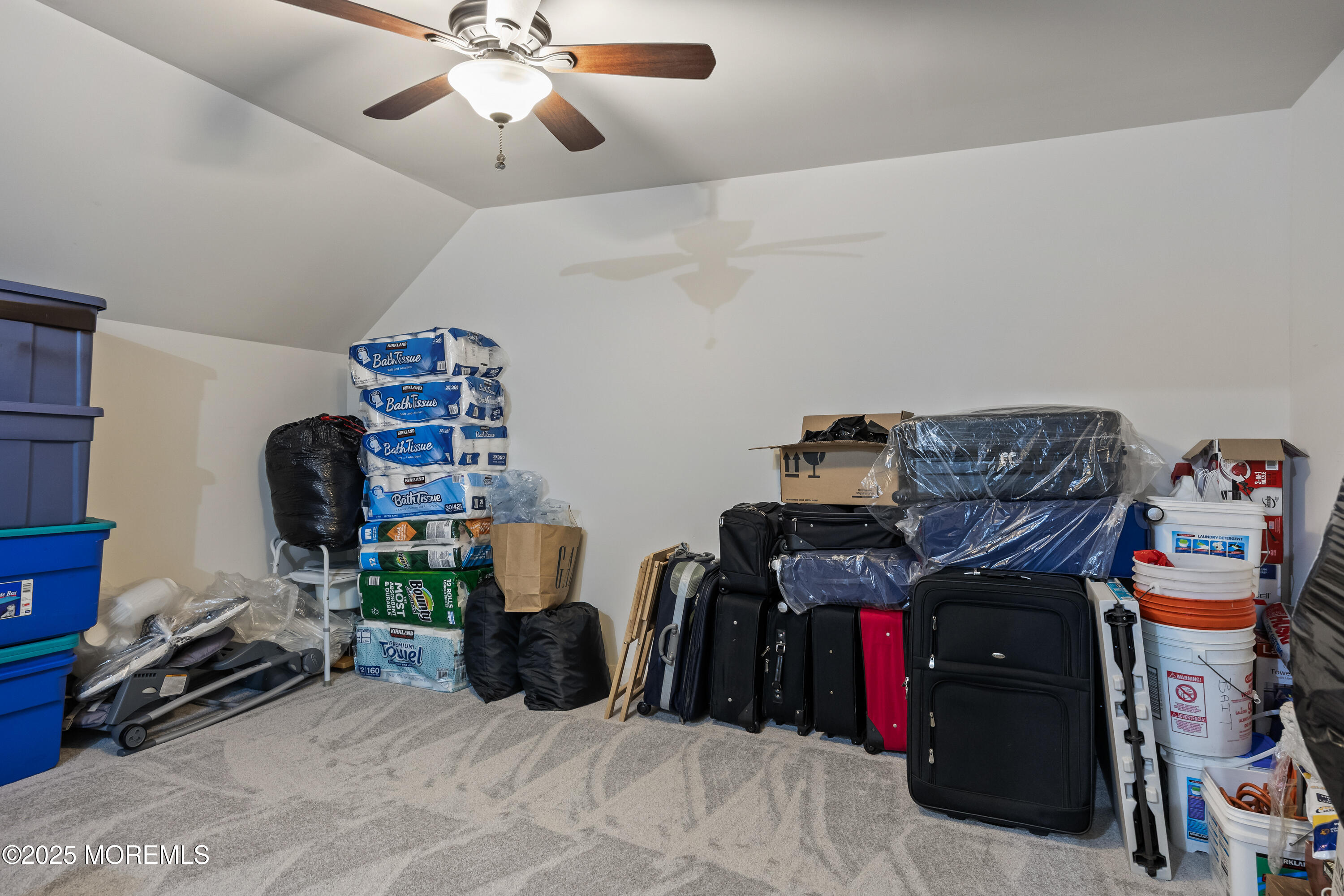 67 Sequoia Parkway Asbury Park, NJ 07712 - Photo 23 of 38 a bedroom with furniture and a chandelier