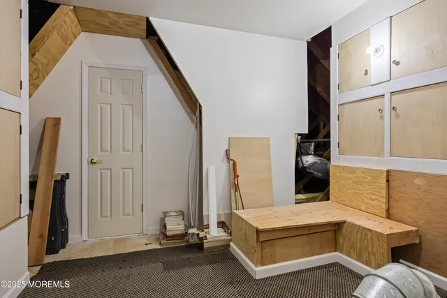 a view of a chairs on wooden deck
