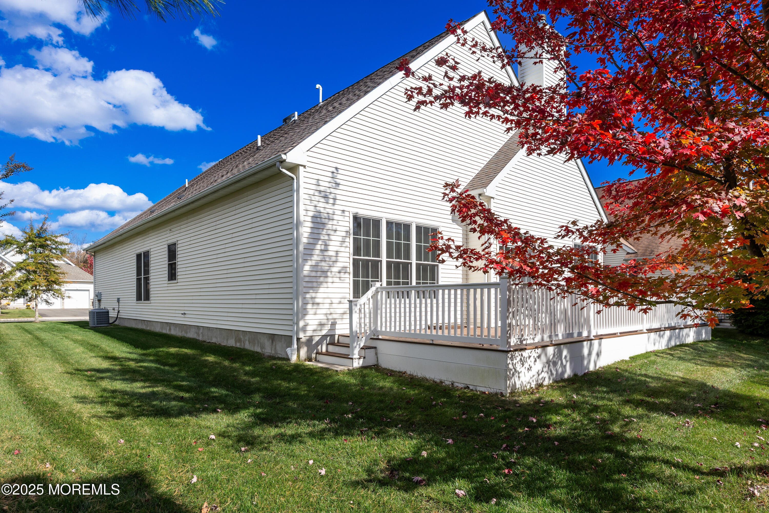 67 Sequoia Parkway Asbury Park, NJ 07712 - Photo 27 of 38 a front view of a house with a garden