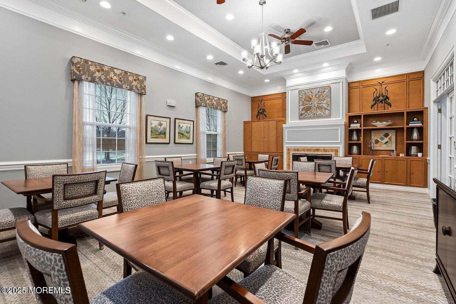 67 Sequoia Parkway Asbury Park, NJ 07712 - Photo 32 of 38 a view of a dining room with furniture and wooden floor