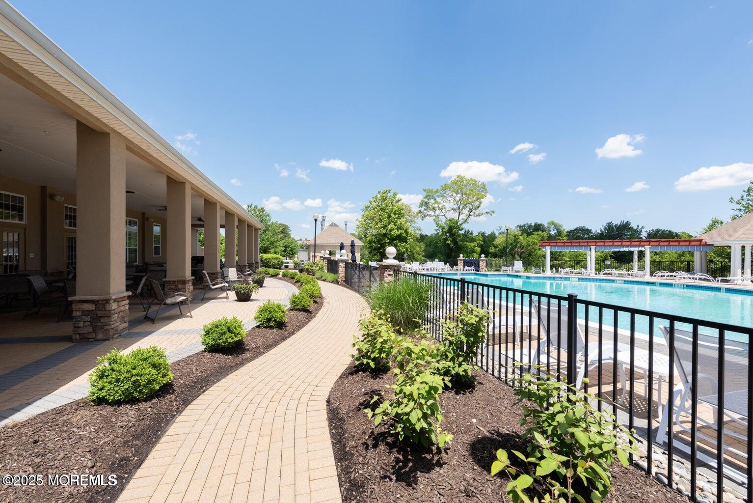 67 Sequoia Parkway Asbury Park, NJ 07712 - Photo 33 of 38 a view of a chair and tables in the balcony