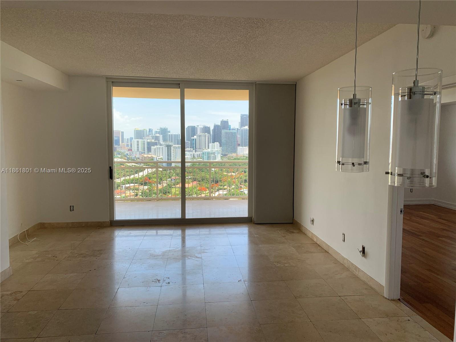 2475 Brickell Avenue, Unit 2504 Miami, FL 33129 - Photo 23 of 32 a view of an empty room with a window