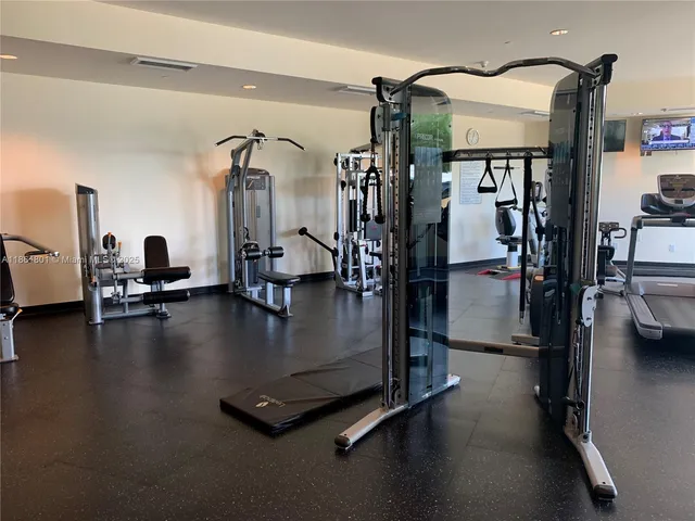 a view of a room with gym equipment