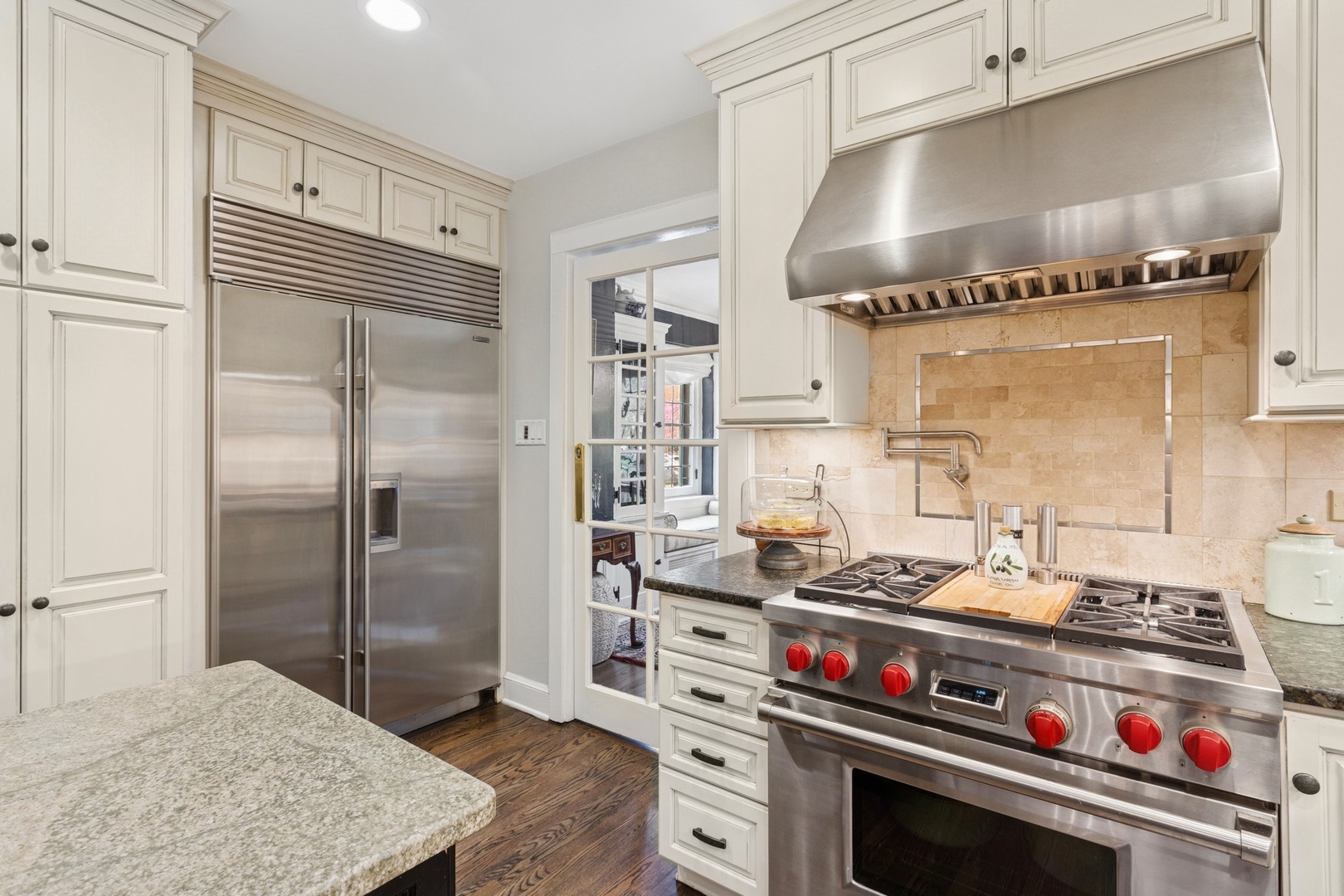 2951 Colfax Street Evanston, IL 60201 - Photo 19 of 62 a kitchen with stainless steel appliances granite countertop a stove and a refrigerator