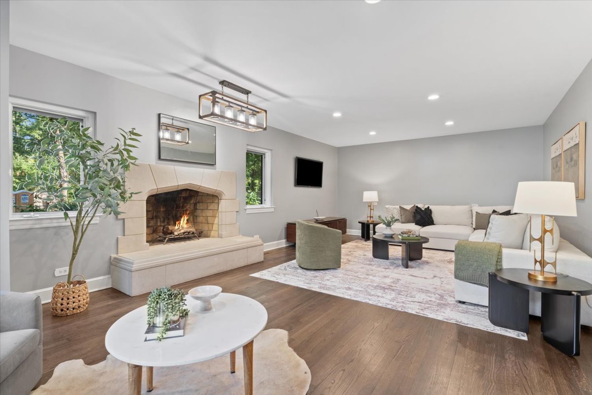 2951 Colfax Street Evanston, IL 60201 - Photo 24 of 62 a living room with furniture potted plant and a fireplace