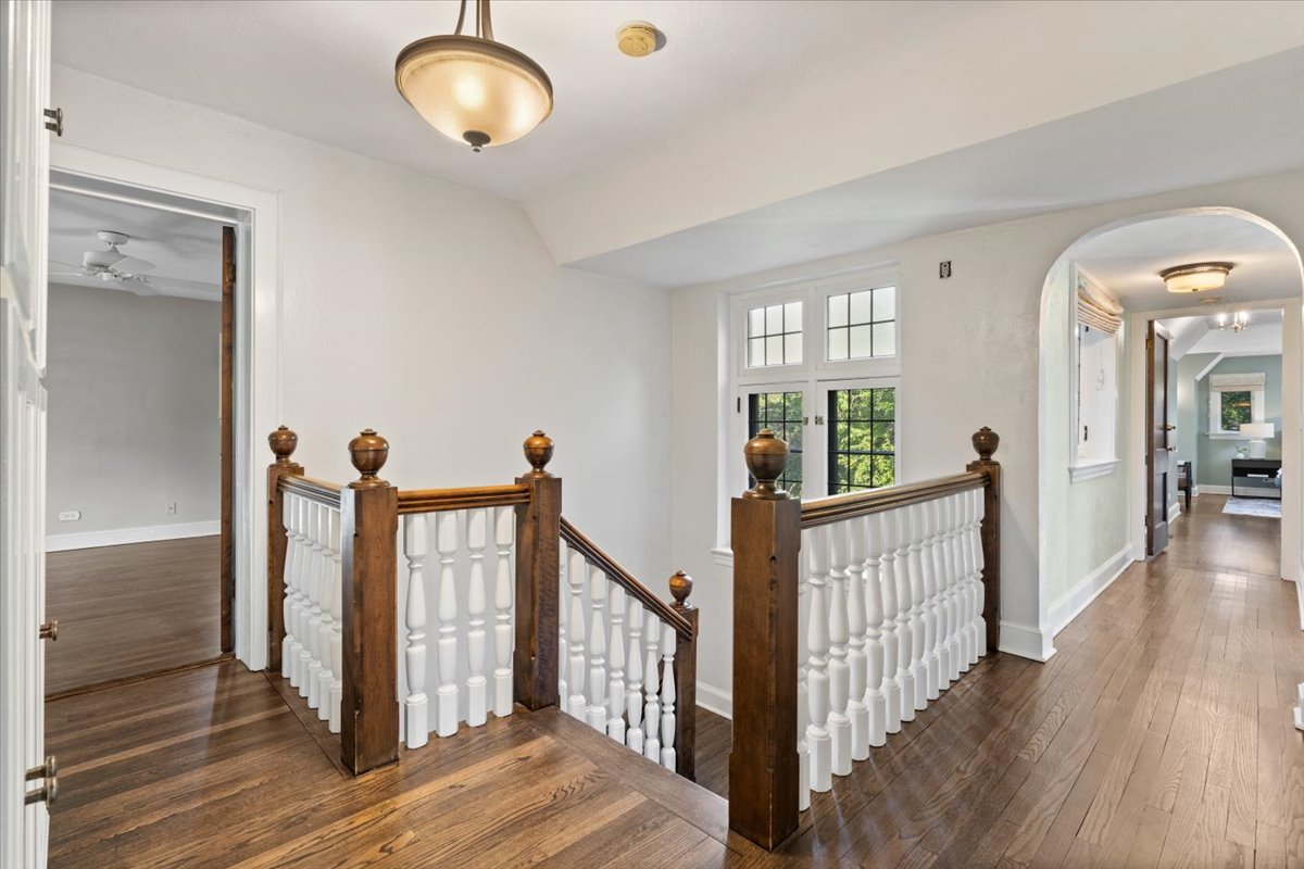 2951 Colfax Street Evanston, IL 60201 - Photo 35 of 62 a view of a hallway with wooden floor and windows