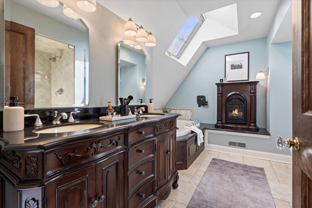 2951 Colfax Street Evanston, IL 60201 - Photo 41 of 62 a kitchen with a sink and a stove top oven