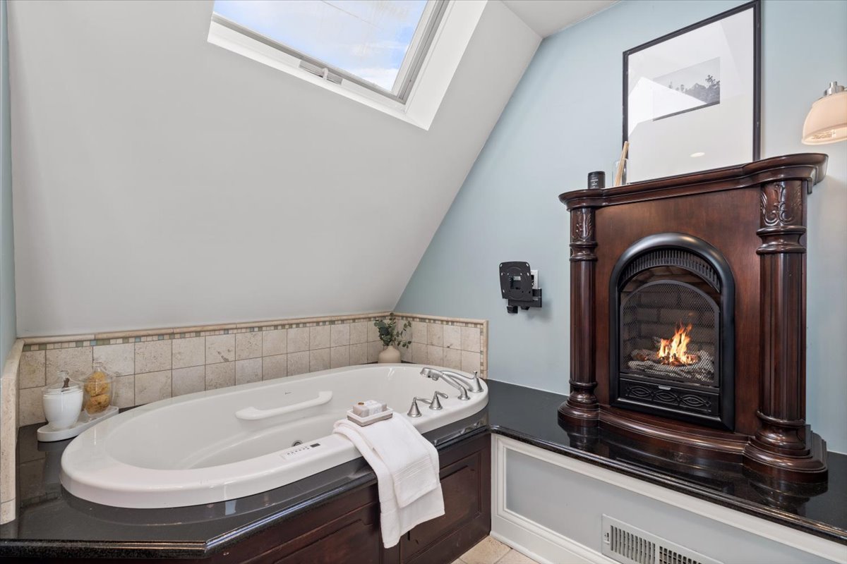 2951 Colfax Street Evanston, IL 60201 - Photo 42 of 62 a bathroom with a sink and a mirror