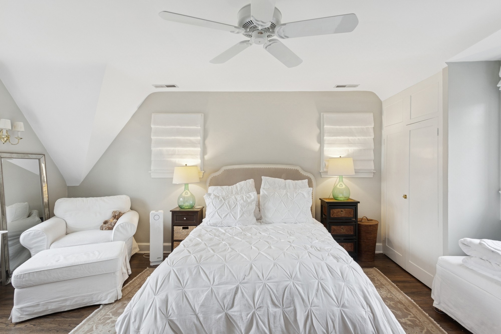 2951 Colfax Street Evanston, IL 60201 - Photo 45 of 62 a bedroom with a bed and a chandelier