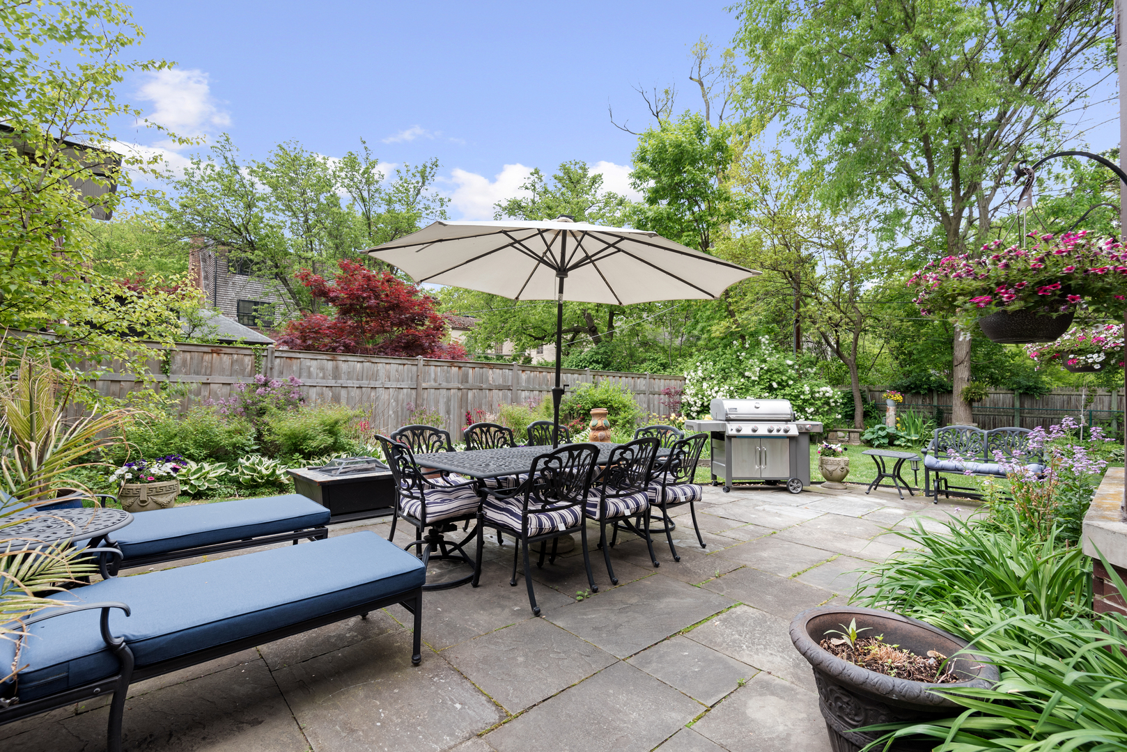 2951 Colfax Street Evanston, IL 60201 - Photo 52 of 62 a view of a patio with table and chairs under an umbrella