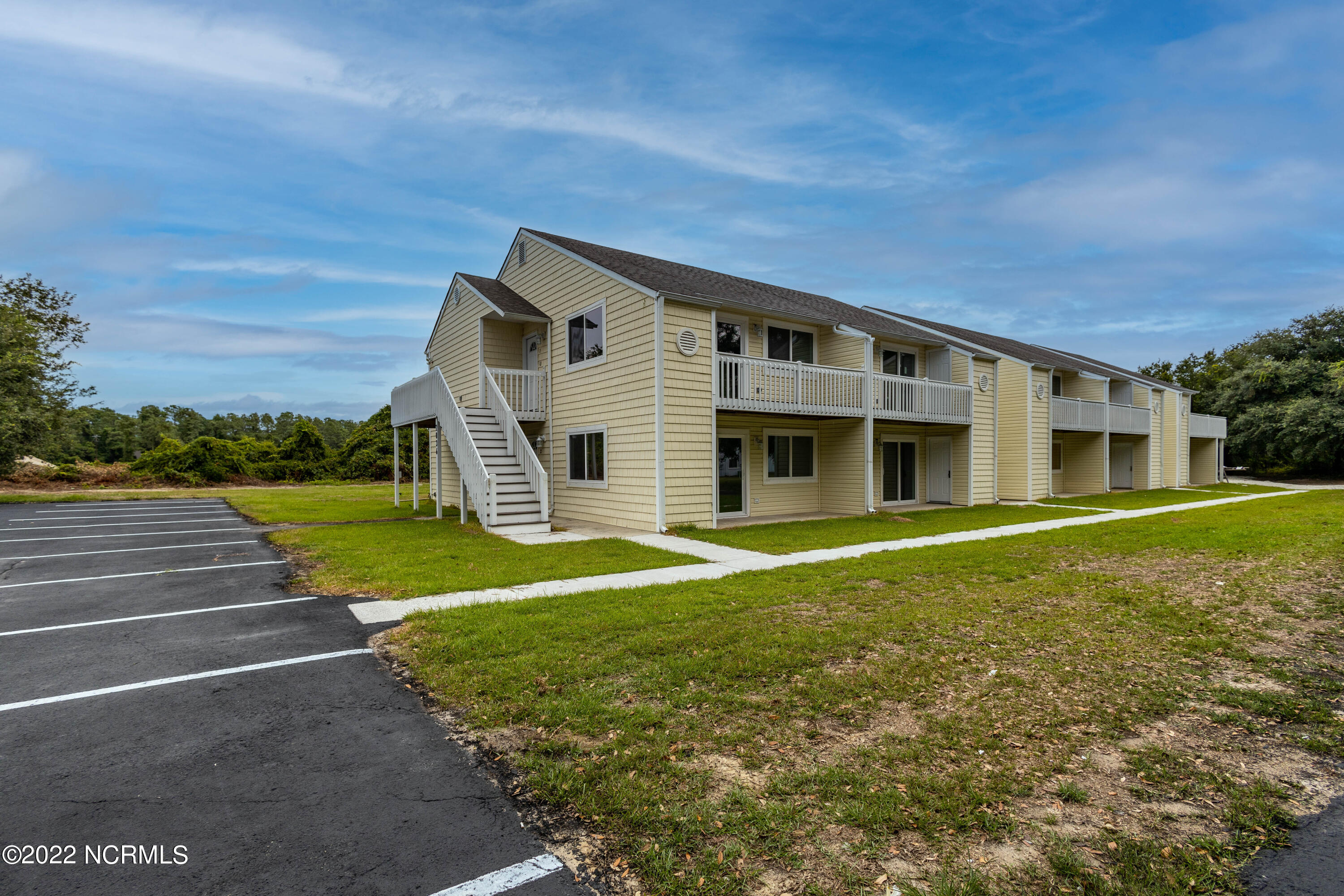2036 Sloop Point Loop Road, Unit A10 Hampstead, NC 28443 - Photo 1 of 8 Building