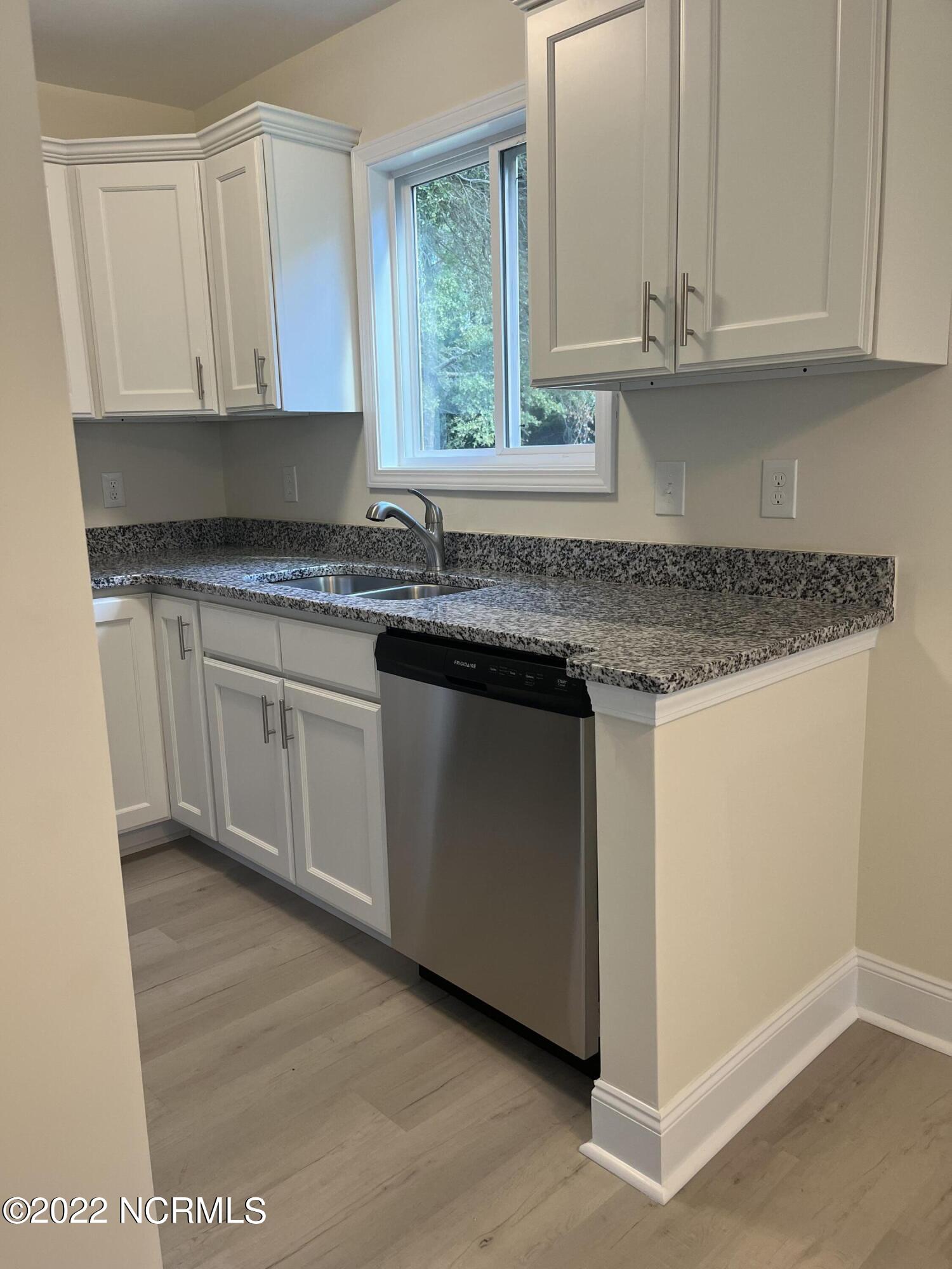 2036 Sloop Point Loop Road, Unit A10 Hampstead, NC 28443 - Photo 6 of 8 Kitchen2